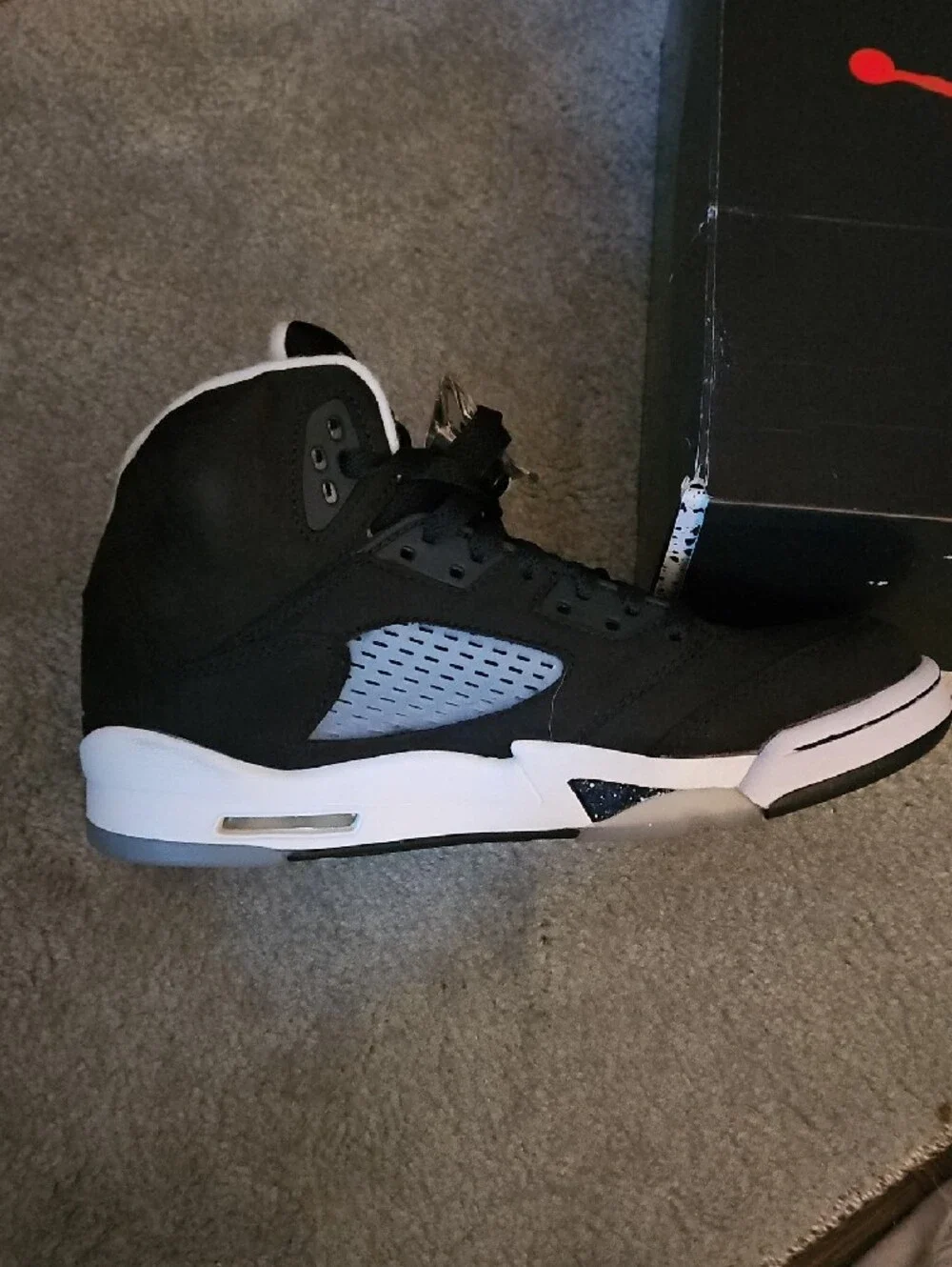 Jordan Men’s Mid-Top Sneaker in Black and White